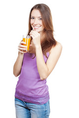 Beautiful brunette woman holding glass of juice