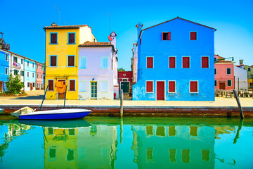 Venice landmark, Burano canal, colorful houses and boats, Italy