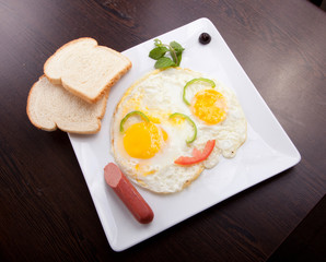 Fried eggs, toasts and Sausage