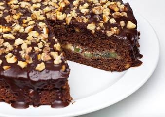 chocolate cake with walnuts and icing