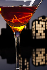 Metropolis Manhattan cocktail in city skyline setting