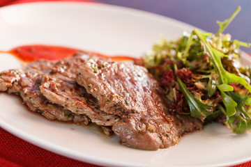 steak with salad