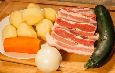pork, potatoes, carrots onions and zucchini