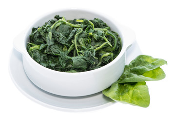 Cooked Spinach isolated on white