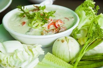 Simmer soft crab boiled in coconut milk with fresh vegetables.