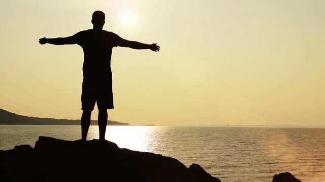 Victory Pose Man On Top of Cliffs Vacation Holiday Concept HD