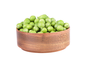 peas in a wooden bowl