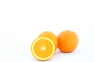 Orange fruit on white background