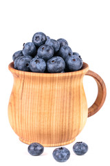 blueberries in wooden bowl