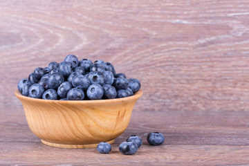 blueberries in wooden bowl