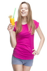 Obraz premium young beautiful blond woman drinking orange juice