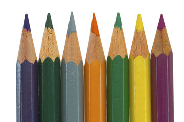 seven colored pencils in a row