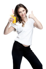 young woman holding glass of orange juice