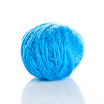 Blue Ball of knitting yarn on a white background