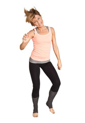 Fototapeta premium Cute woman standing and dancing on isolated white background