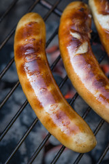 Sausages on charcoal grill