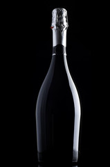 Bottle of champagne on black