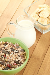 Delicious and healthy cereal in bowl with milk