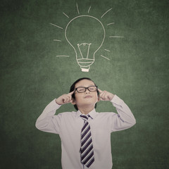 Little businessman concentrate on ideas