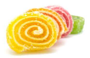 Delicious colorful marmalade isolated on white background