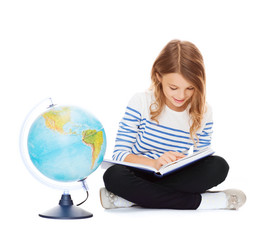 girl with globe and book