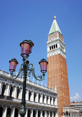 Fototapeta na wymiar Saint Mark campanile on San Marco square in Venice, Italy