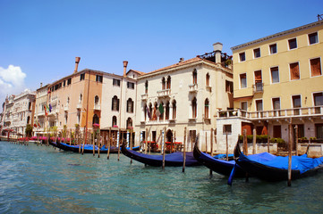 Fototapeta na wymiar Gondola in famous Grande Canal in Venice, Italy