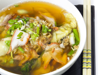 Soup with sliced pork and dumplings