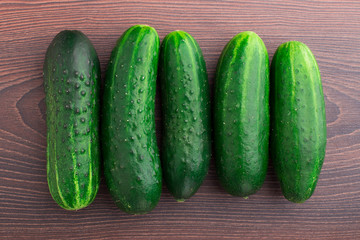 Cucumbers on wooden table