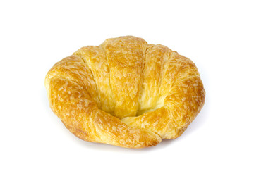 Fresh and tasty croissant over white background
