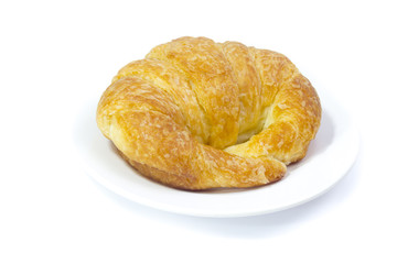 Fresh and tasty croissant over white background