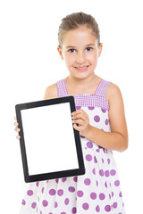 Cute little girl showing blank tablet screen