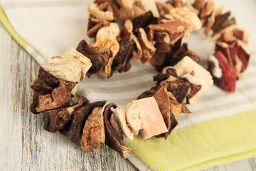 Dried mushrooms on wooden background