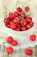 Cherry berries on wooden table close up