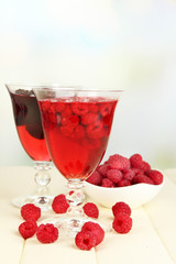 Jelly with fresh berries on wooden table