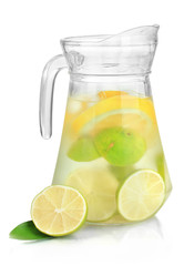 Cold water with lime, lemon and ice in pitcher isolated on