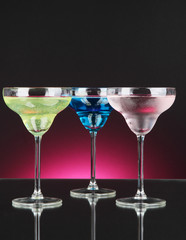 Cocktails on dark color background