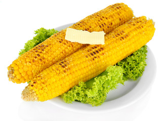 Delicious golden grilled corn with butter isolated on white