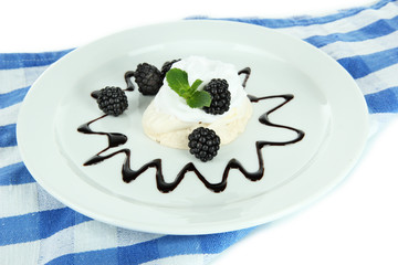 Tasty meringue cake with berries, isolated on white