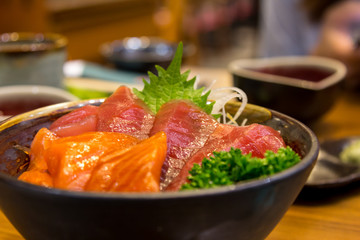 Salmon and tuna set on table