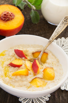Breakfast, oatmeal with peaches.