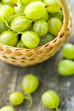 gooseberry in a basket on wooden background