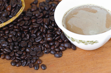 Coffee Beans on a wooden floor