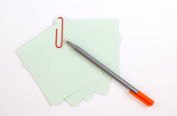 Colorful note paper with clips isolated on white background