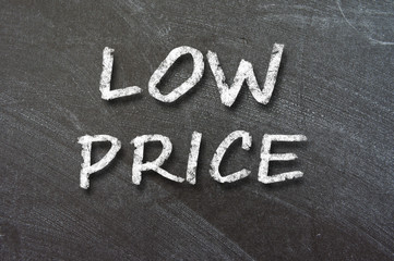 Fototapeta premium Low price handwritten with white chalk
