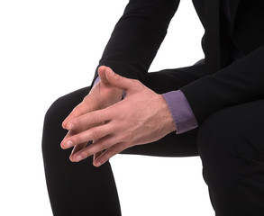 Hands clasped. Close-up of businessman keeping his hands clasped