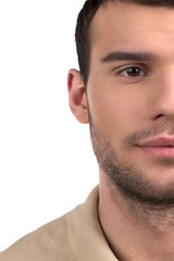 Fototapeta premium Young man. Cropped image of handsome young man isolated on white