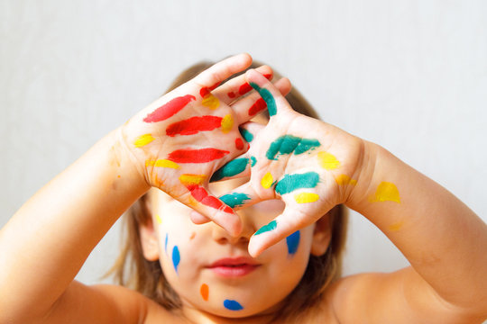 hands soiled in a paint