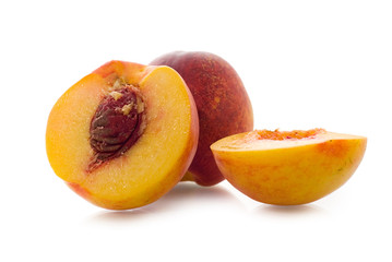 Nectarines over a white background