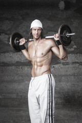 Handsome bodybuilder posing in front of the camera